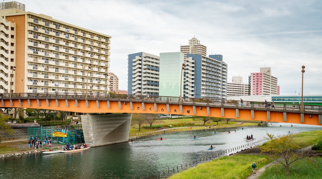 Ojima Komatsugawa Park which includes a city, a river or creek and a bridge