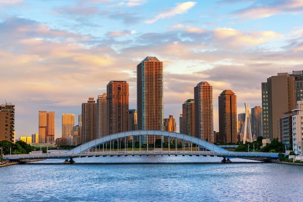 Beautiful scene of Sumida river with famous Eitai bridge and Okawabata Rivercity and modern Tsukishima district Tokyo, Japan, travel background