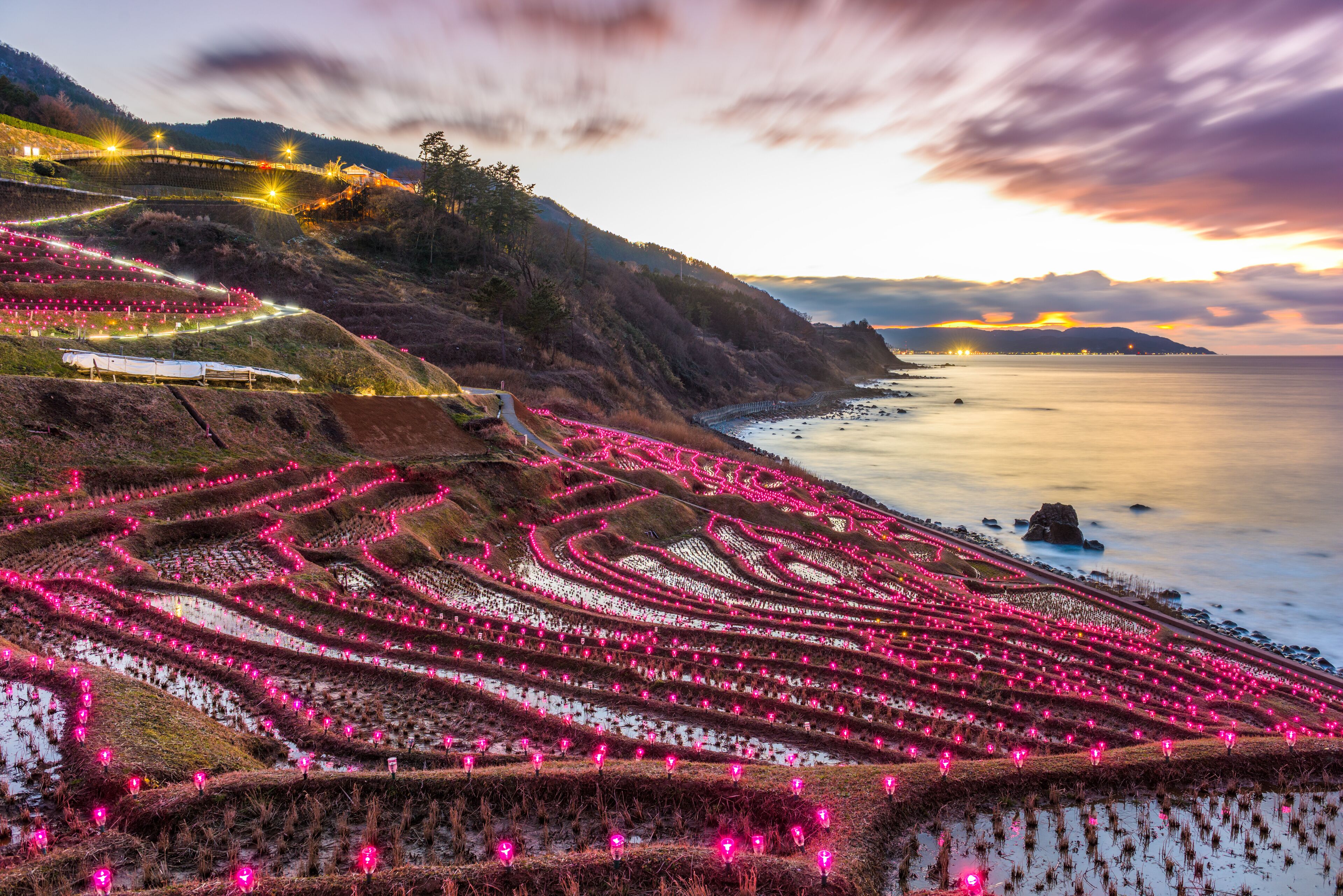 Wajima, Japan at Shiroyone Senmaida rice terraces night light up.