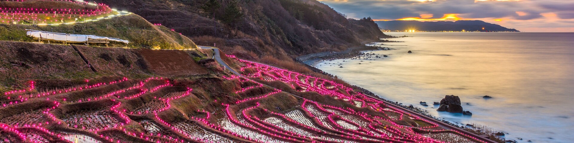 Wajima, Japan at Shiroyone Senmaida rice terraces night light up.