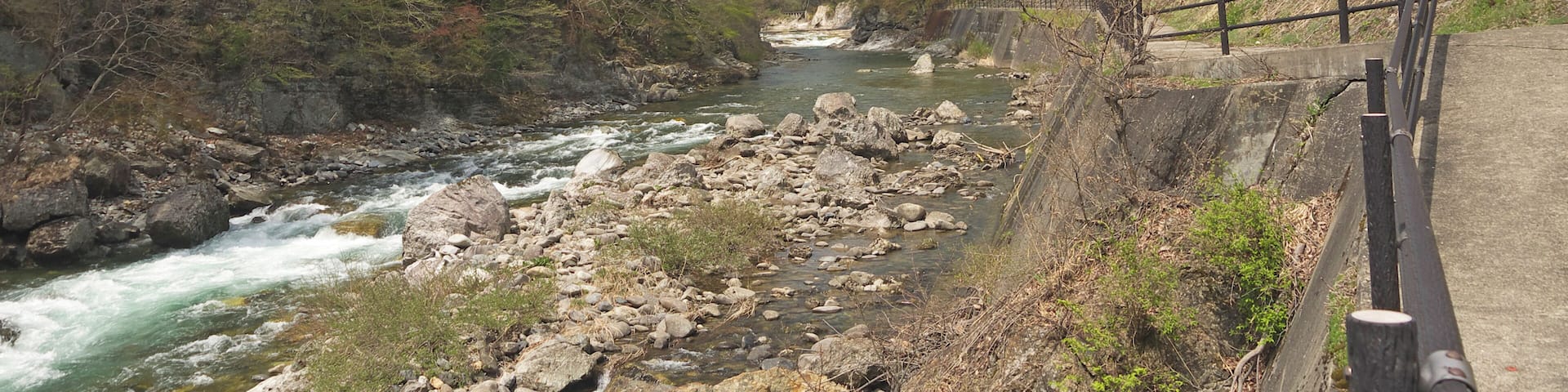 Beautiful Suwakyo Gorge view, Hiking trail by the mountain river in Minakami, springtime, wooden footpath, forest, water flowing, big Suwakyo Bridge