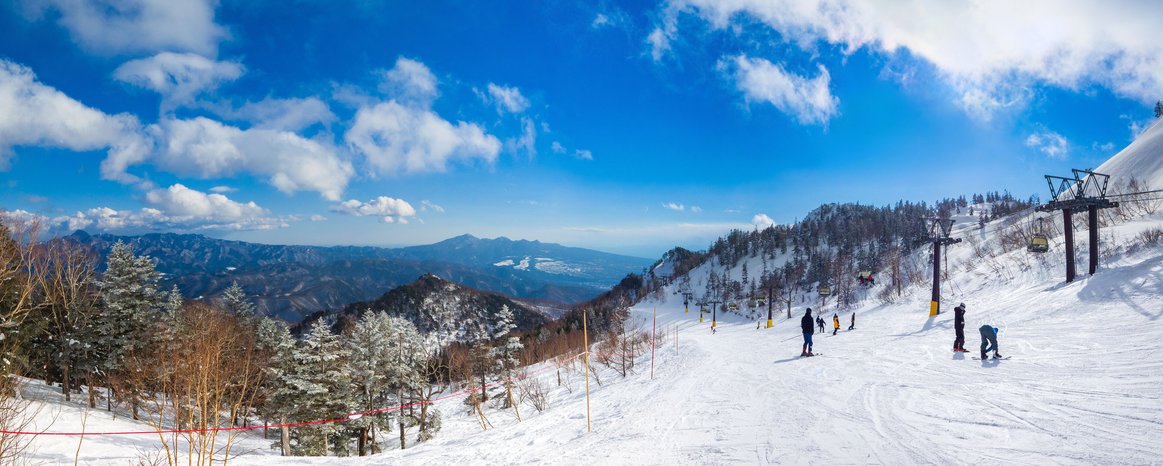 Panoramic view from the top of the ski resort on a sunny day (Kawaba, Gunma, Japan)