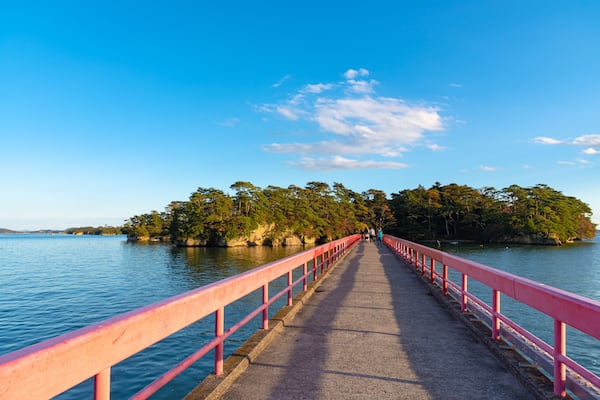 Fukuura Island with Fukuura Bridge in the famous Matsushima Bay. Beautiful islands covered with pine trees and rocks. One of the Three Views of Japan. Miyagi Prefecture, Japan