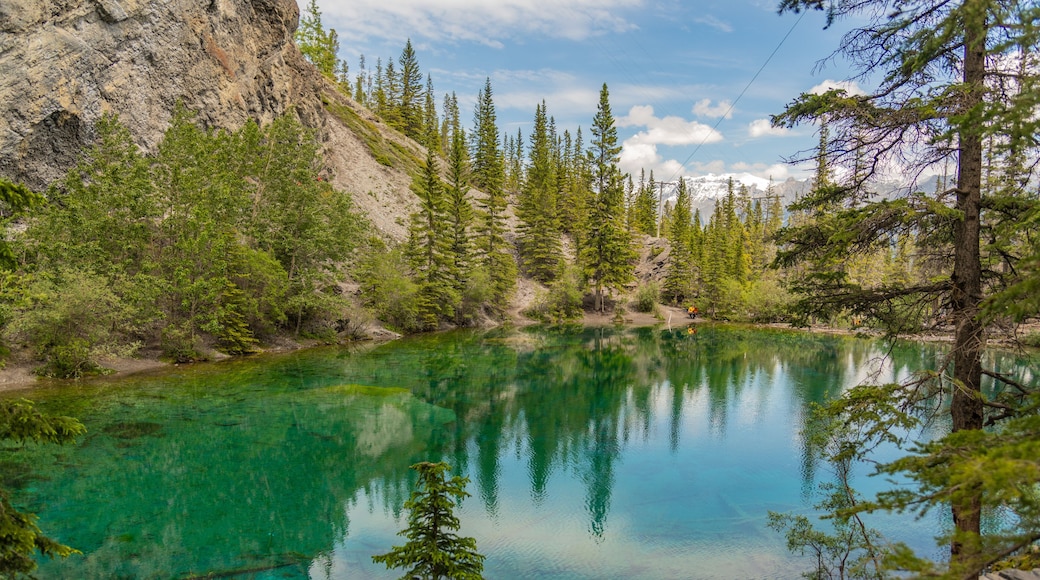 Breathtaking views of the upper and lower Grassi Lakes with brilliant turquoise and aqua waters set in a serene wilderness outside the town of Canmore near Kananaskis during the summer season.