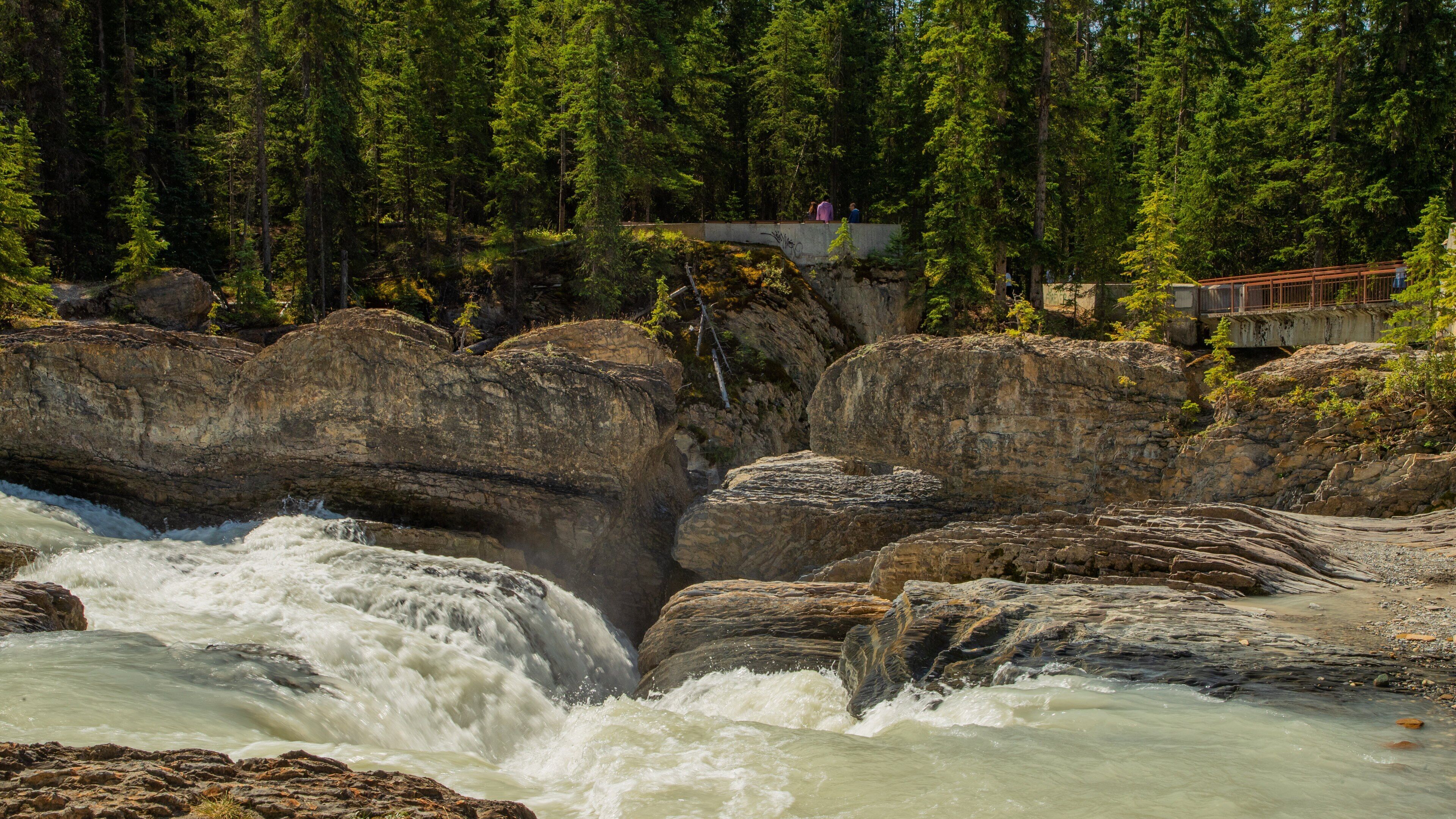 Natural Bridge which includes a river or creek, rapids and a gorge or canyon