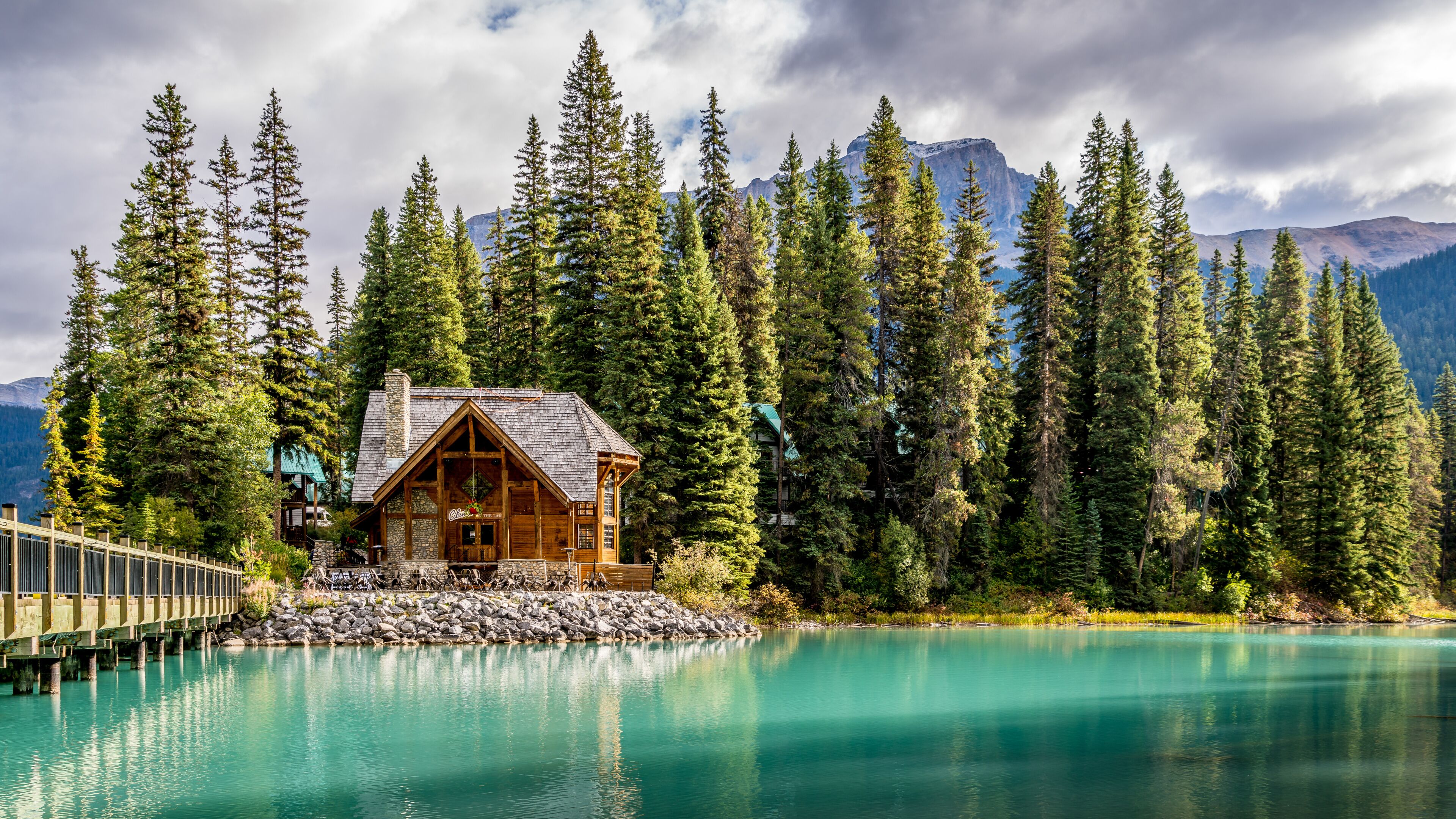 Emerald Lake, Yoho National park, British Columbia, Canada - Sept. 16, 2021: Bridge over Emerald Lake to the Cilantro Café and Emerald Lodge