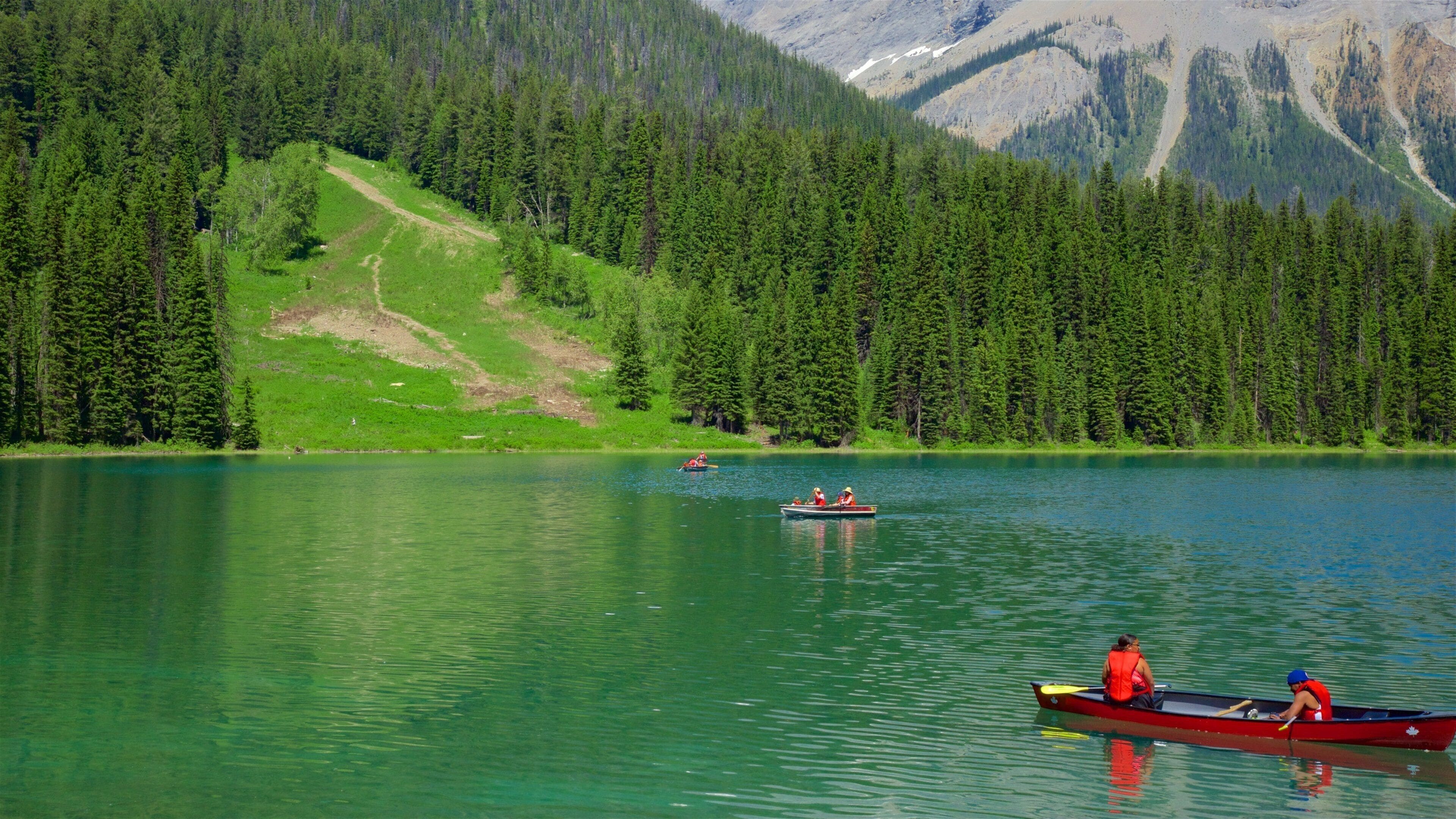 Yoho National Park featuring a lake or waterhole, kayaking or canoeing and tranquil scenes