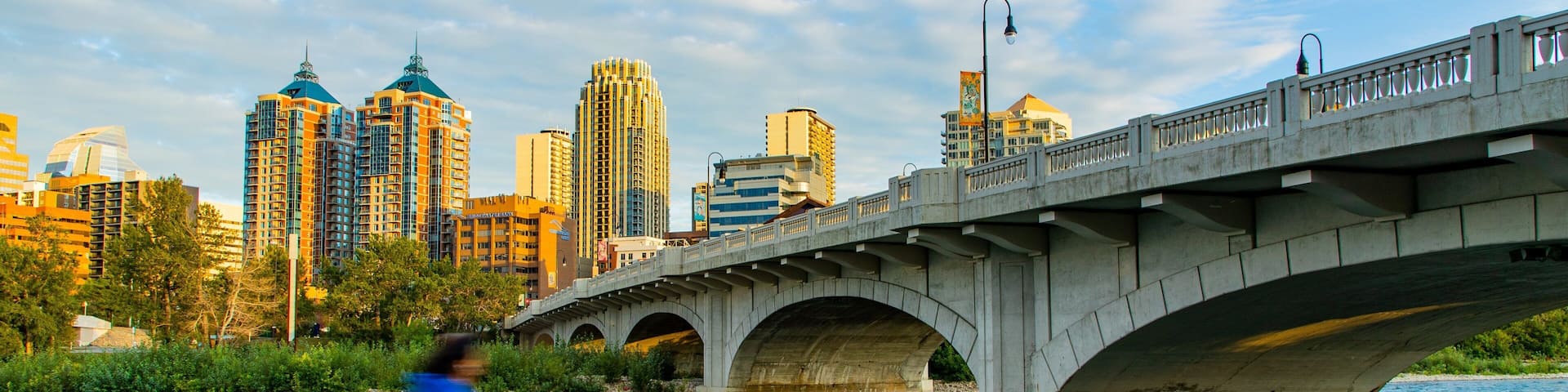 Bow River featuring a city, cycling and a river or creek