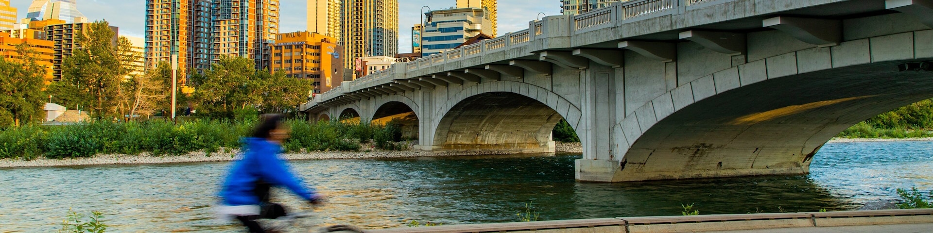 Bow River featuring a city, cycling and a river or creek