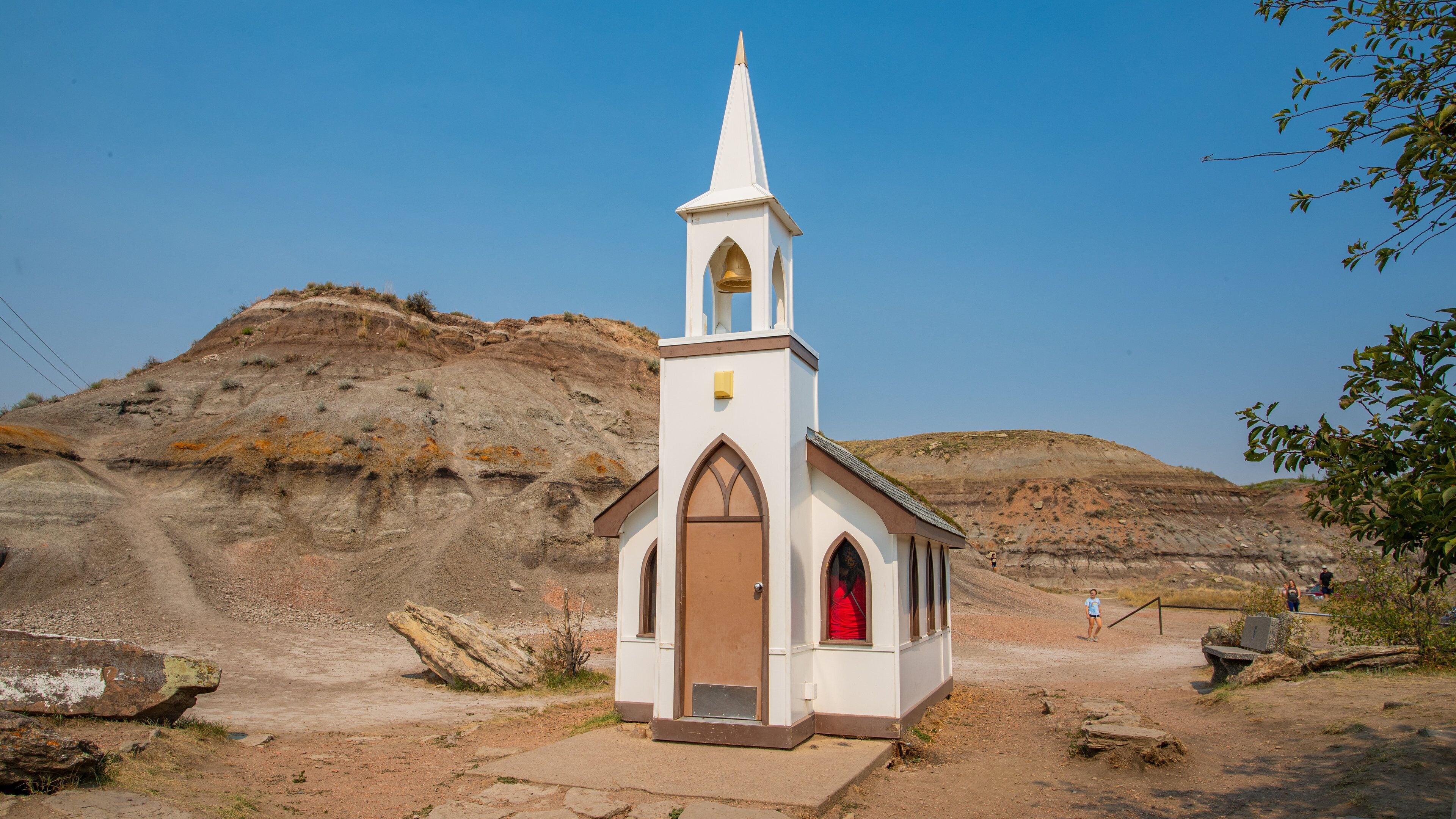 Drumheller\'s Little Church featuring farmland and a church or cathedral