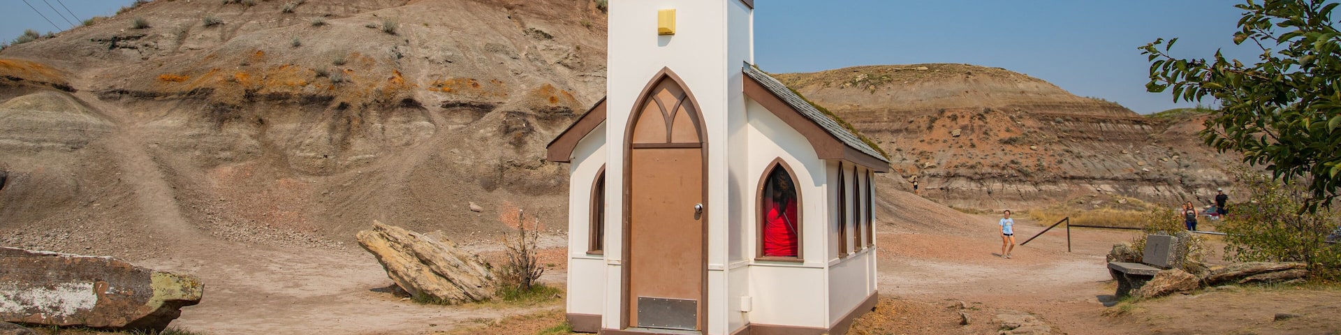 Drumheller\'s Little Church featuring farmland and a church or cathedral