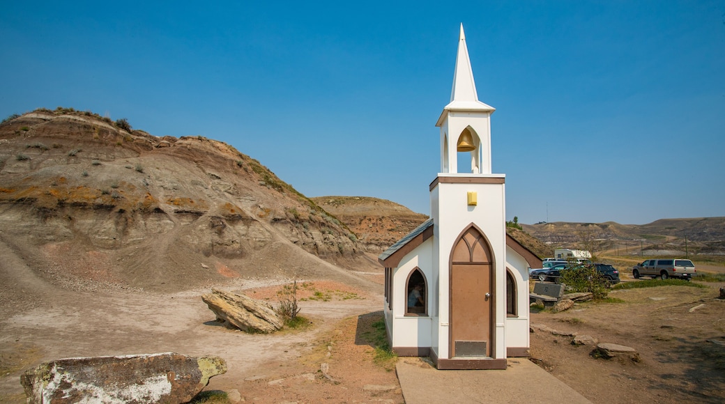 Drumheller\'s Little Church which includes a church or cathedral and desert views