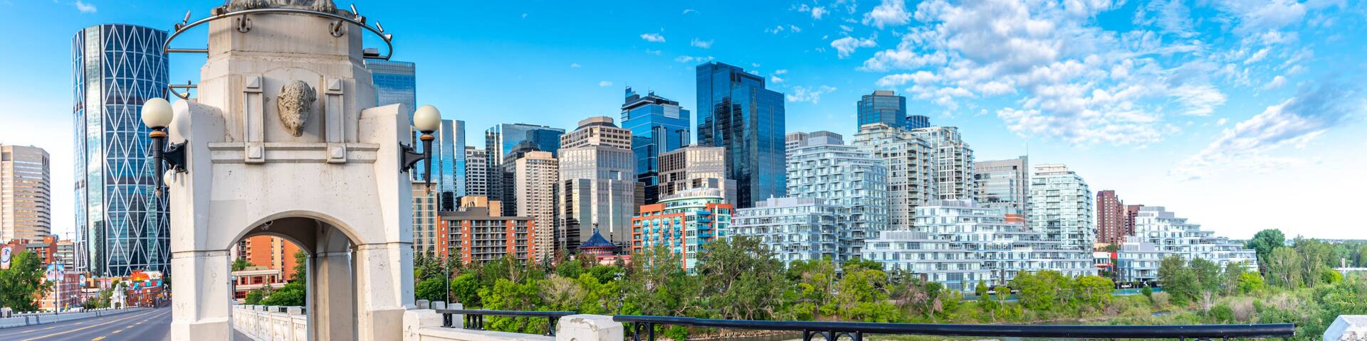 Panoramic view of Calgary's skyline on a summer day.
