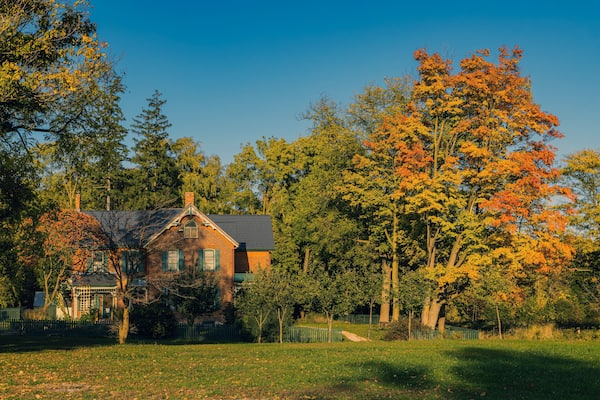 Spruce Lane Farmhouse in Bronte Creek Provincial Park in Oakville, Ontario. Built in 1899, the Spruce Lane Farmhouse is a historic house museum..