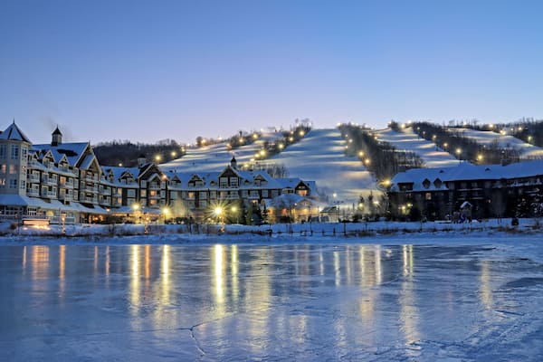 Blue Mountain Village with ski slopes, lodges and spas in the evening