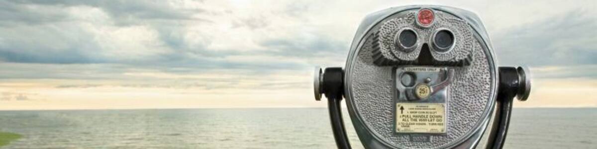 USA, New York, Lake Ontario, coin-operated binoculars at sunset