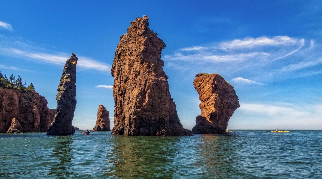 Nova Shores Adventures offers a fantastic 6-hour sea kayak tour in the Bay of Fundy around the Cape Chignecto coastline at high tide. A highlight was seeing the "Three Sisters" sea stacks, pictured here, up close. The tour offered by Nova Shores Adventures is suitable for beginners, taking you around at an easy pace that gives you opportunities to explore and learn about the geology and history of this region. There may be no better way to see this beautiful, wild stretch of coastline.