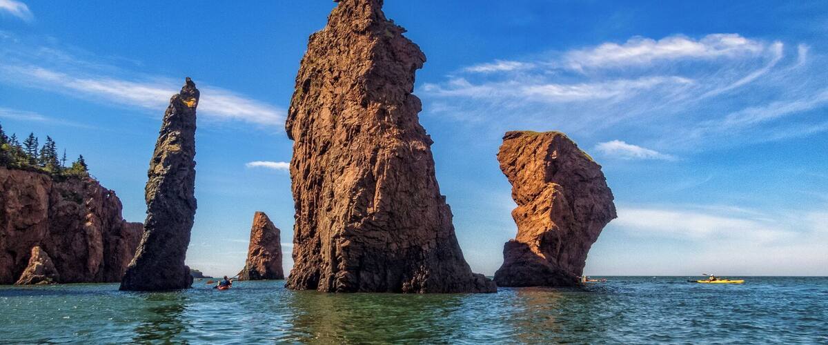 Nova Shores Adventures offers a fantastic 6-hour sea kayak tour in the Bay of Fundy around the Cape Chignecto coastline at high tide. A highlight was seeing the "Three Sisters" sea stacks, pictured here, up close. The tour offered by Nova Shores Adventures is suitable for beginners, taking you around at an easy pace that gives you opportunities to explore and learn about the geology and history of this region. There may be no better way to see this beautiful, wild stretch of coastline.