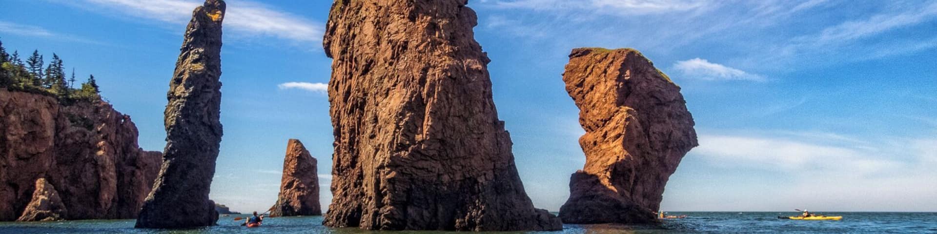Nova Shores Adventures offers a fantastic 6-hour sea kayak tour in the Bay of Fundy around the Cape Chignecto coastline at high tide. A highlight was seeing the "Three Sisters" sea stacks, pictured here, up close. The tour offered by Nova Shores Adventures is suitable for beginners, taking you around at an easy pace that gives you opportunities to explore and learn about the geology and history of this region. There may be no better way to see this beautiful, wild stretch of coastline.