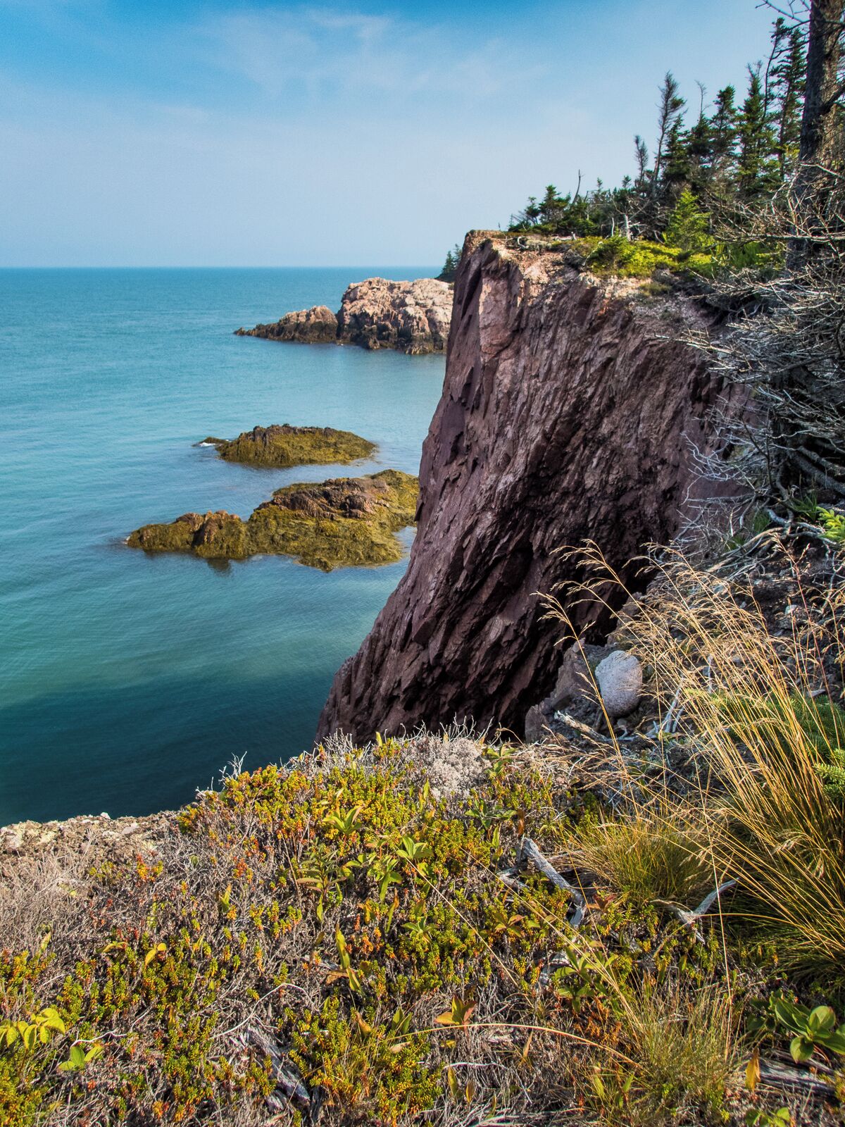 Sheer cliffs and tropical blue waters...at Cape Chignecto Provincial Park, Nova Scotia. 