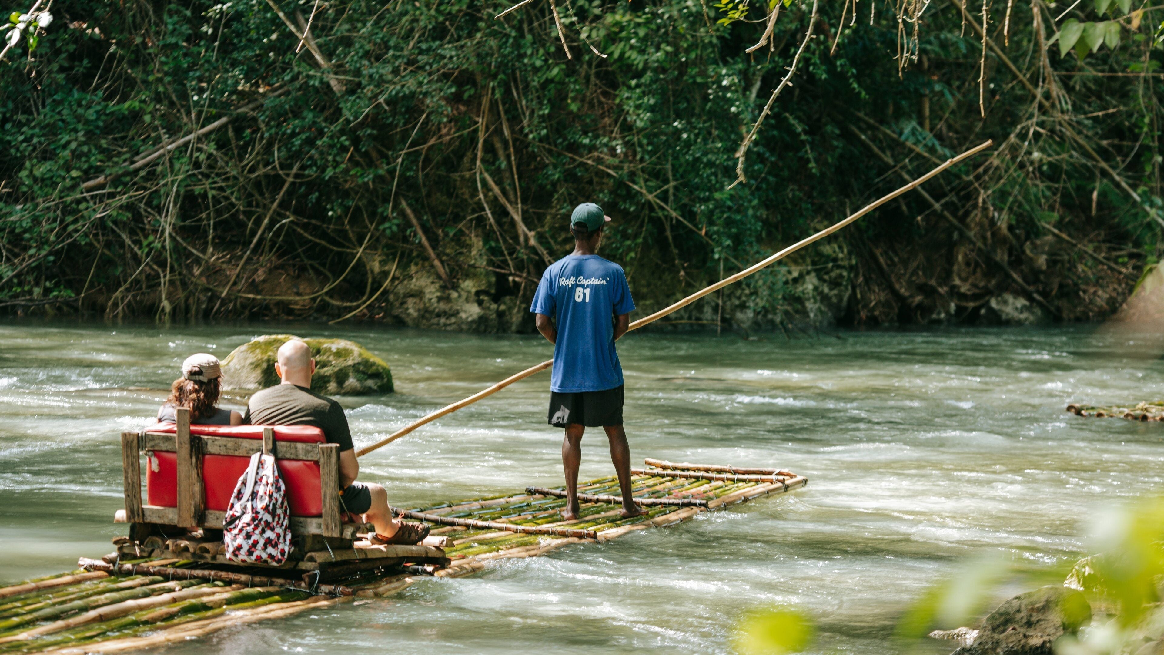 Martha Brae River showing kayaking or canoeing and a river or creek as well as an individual male