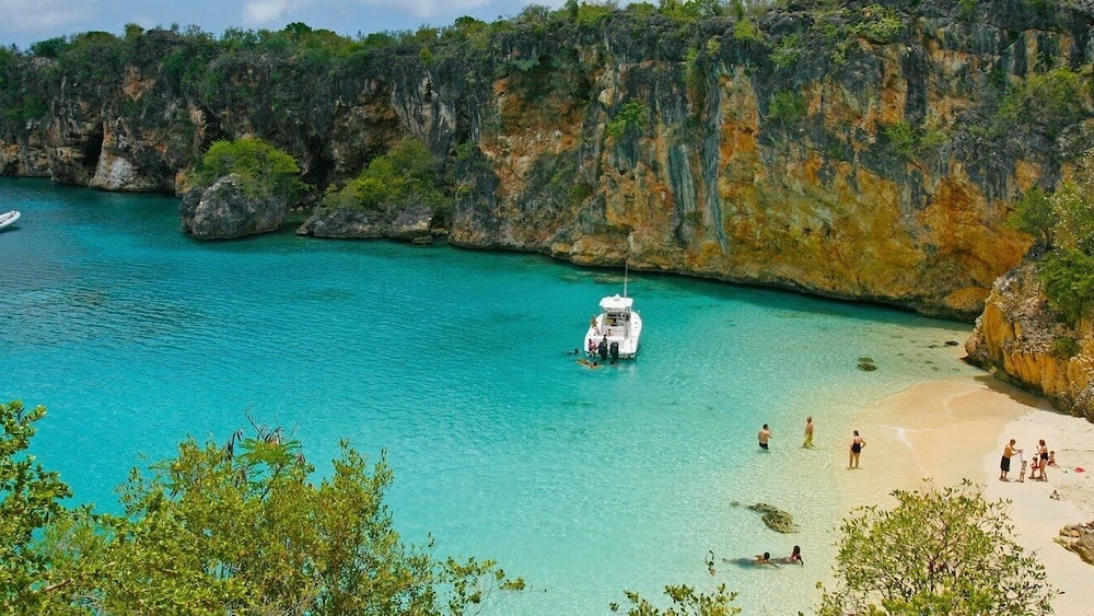 Great spot only accessible by boat from crocus bay are you have to climb down a rope to get there. The water is crystal clear ,great snorkeling , bird watching, and is one of the most serene places on the island of Anguilla.