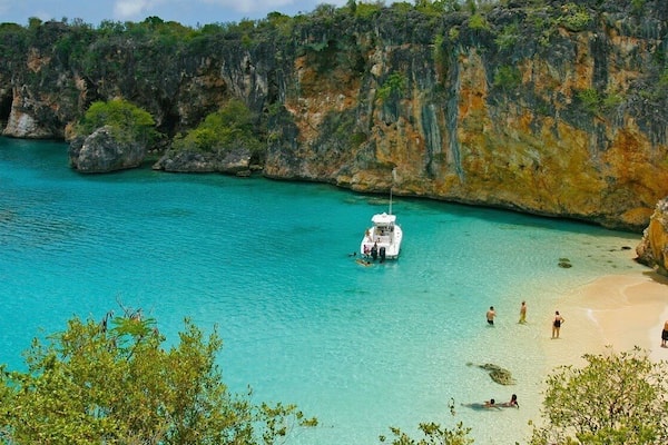 Great spot only accessible by boat from crocus bay are you have to climb down a rope to get there. The water is crystal clear ,great snorkeling , bird watching, and is one of the most serene places on the island of Anguilla.