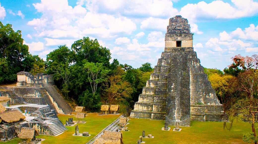 Tikal National Park on Unesco World Heritage. The Grand Plaza with the North Acropolis and Temple I (Great Jaguar Temple)