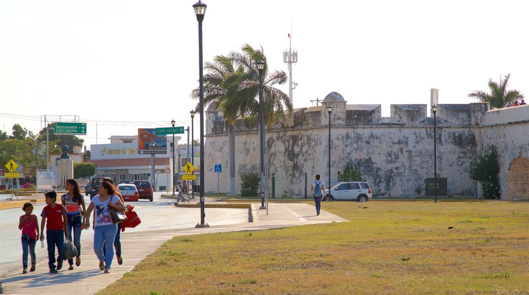 Baluarte de San Juan which includes a park as well as a small group of people
