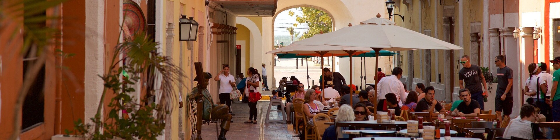 Sea Gate which includes outdoor eating as well as a small group of people