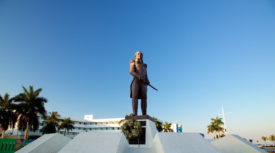 Skulptur af Pedro Sainz de Baranda som viser en solnedgang og en statue eller en skulptur