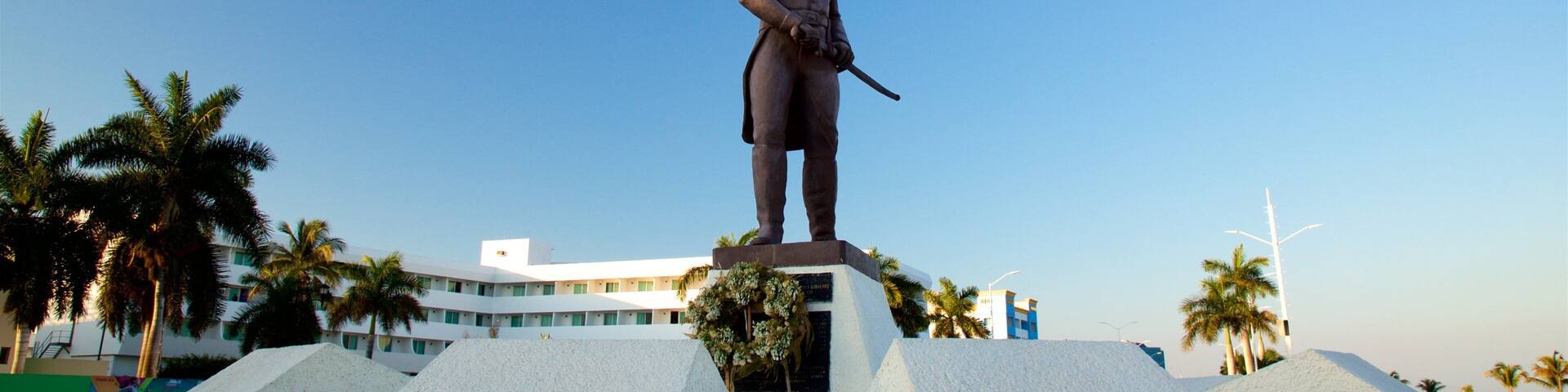 Sculpture of Pedro Sainz de Baranda featuring a sunset and a statue or sculpture