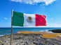Sunny day. Marine coral and sharp stones. Flag of mexico in paradise. Mexican flag. Seaweed floating on the sea. Cozumel southern tip ( El Mirador )