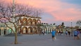 Plaza Mijares which includes a sunset and a square or plaza