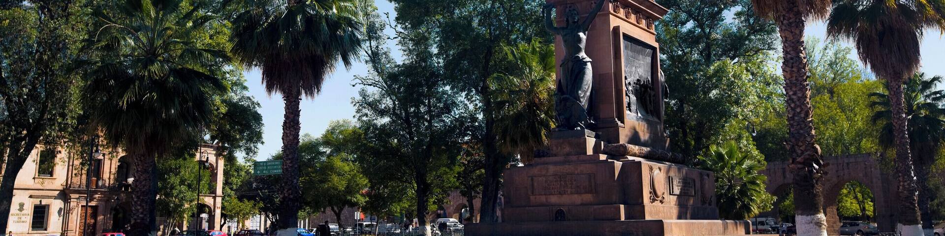 Low angle view of a monument, Monument of Jose Maria Morelos And Pabon, Plaza Hidalgo, Morelia, Michoacan State, Mexico