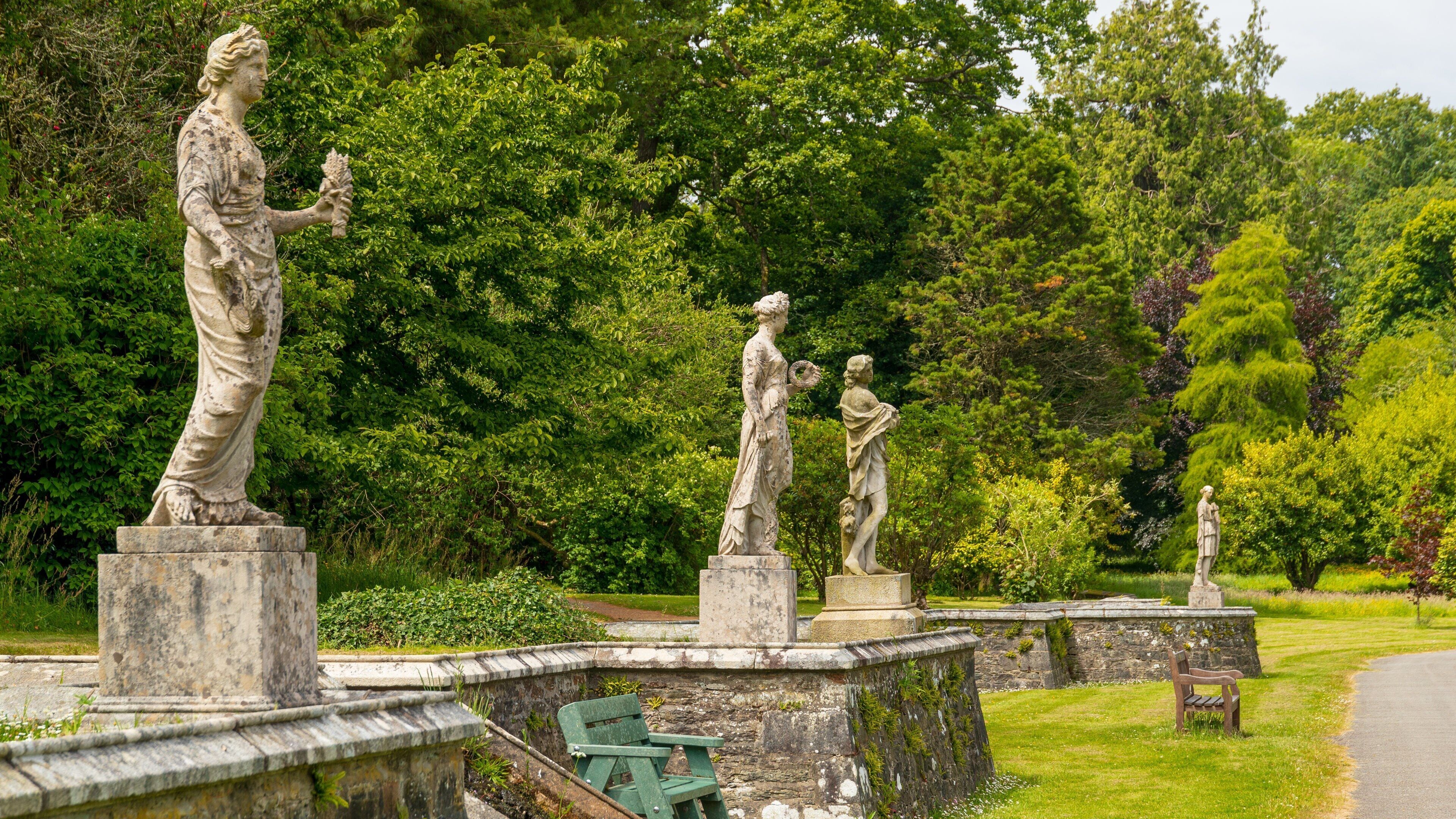 Johnstown Castle & Gardens featuring a statue or sculpture and a garden