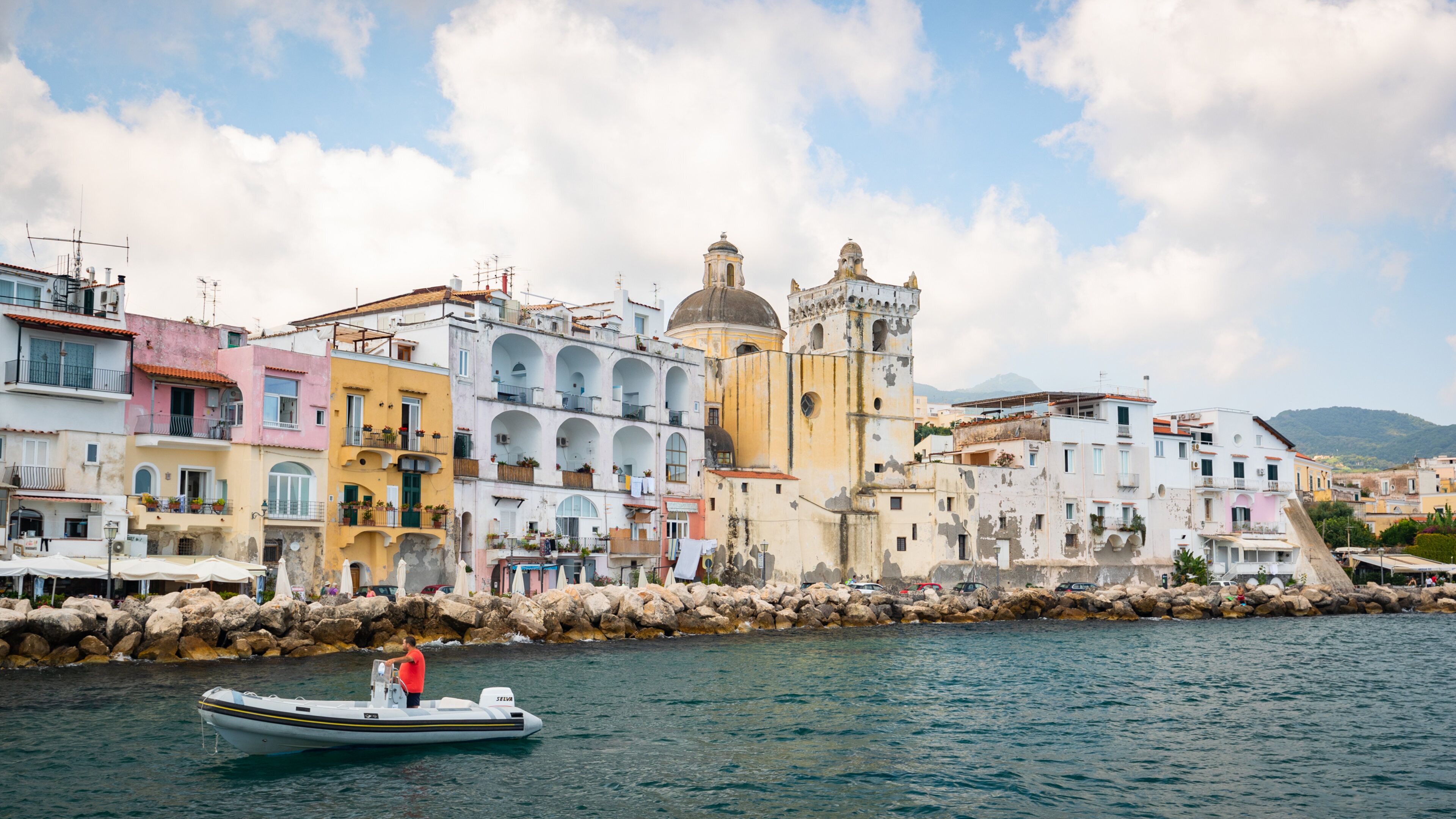 Cathedral of Santa Maria Assunta which includes a coastal town, boating and general coastal views