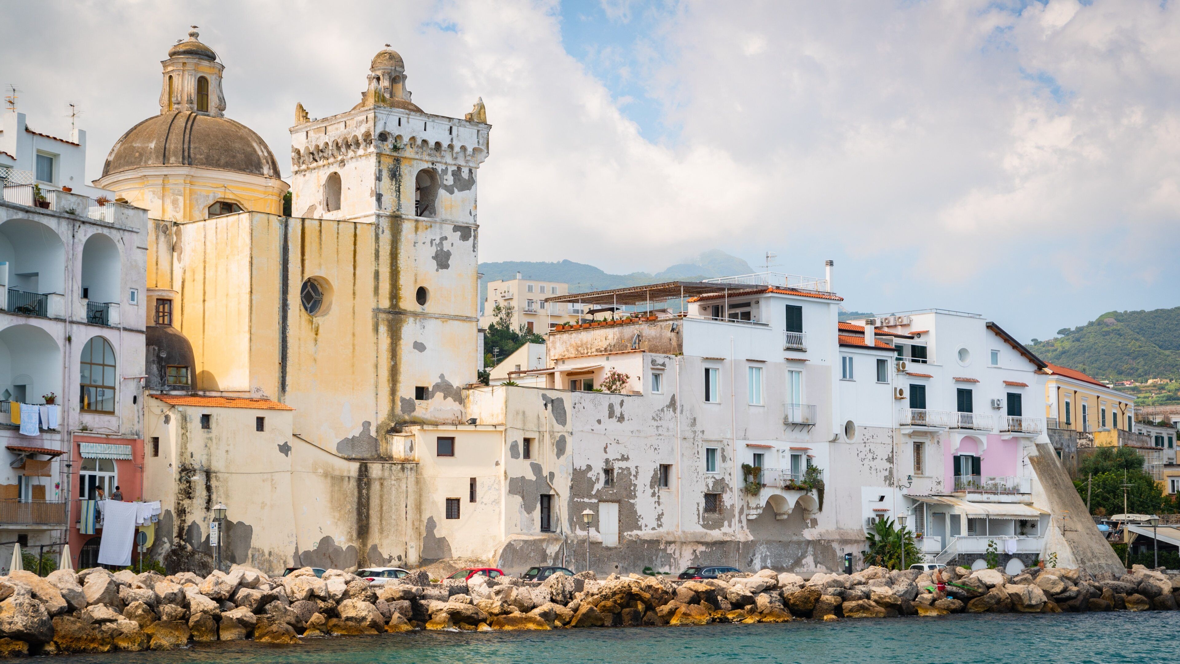 Cathedral of Santa Maria Assunta which includes heritage elements and a coastal town