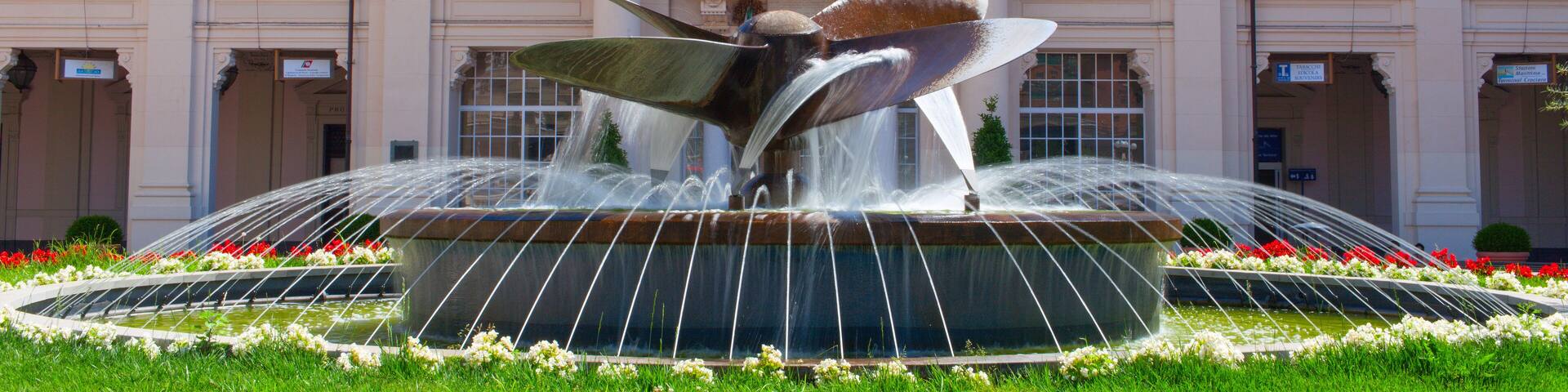 "Stazione Marittima" - central cruise terminal building with propeller fountain in the front.