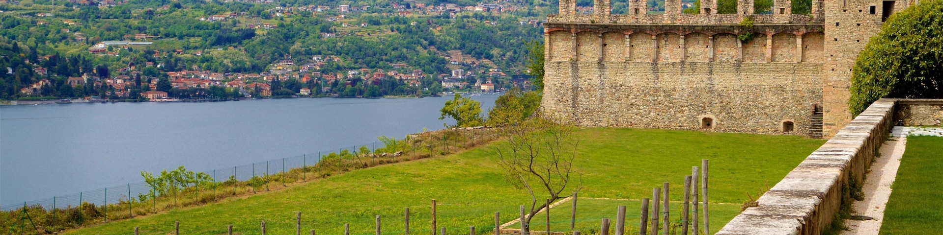 Rocca di Angera which includes heritage elements, tranquil scenes and a small town or village