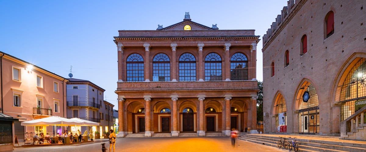 Teatro Amintore Galli showing heritage elements and night scenes