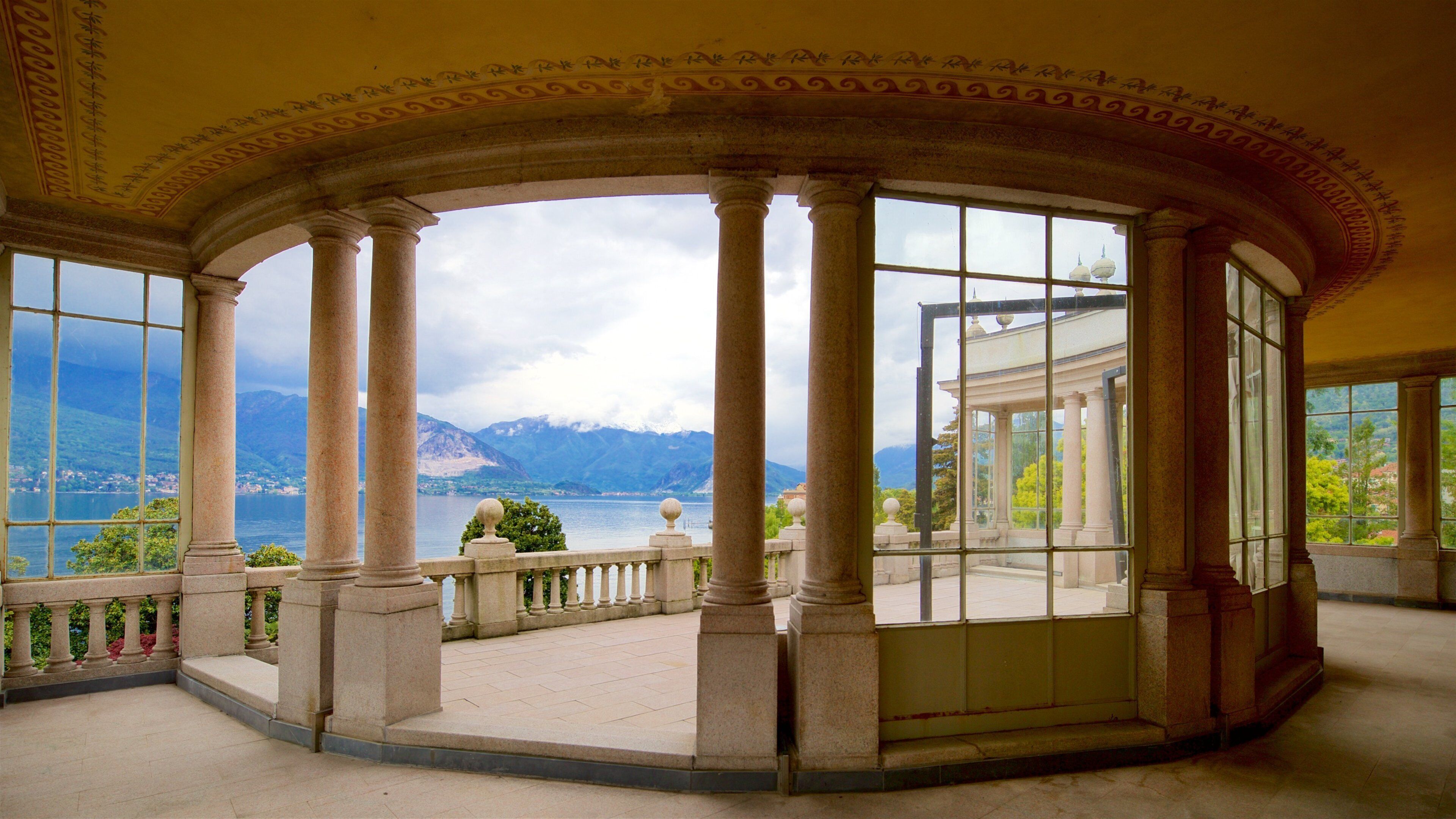 Villa Giulia featuring heritage elements, interior views and a lake or waterhole