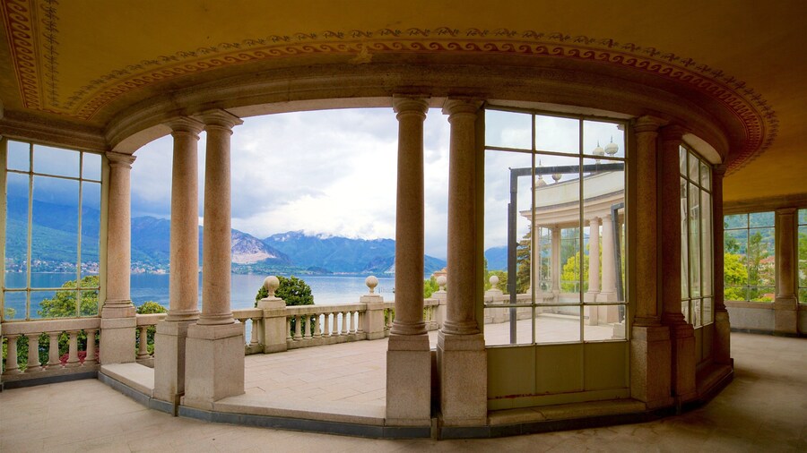 Villa Giulia featuring heritage elements, interior views and a lake or waterhole