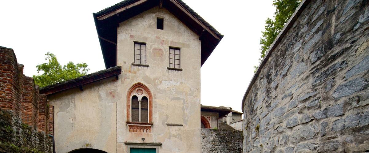 Castello Visconteo which includes heritage elements and a house