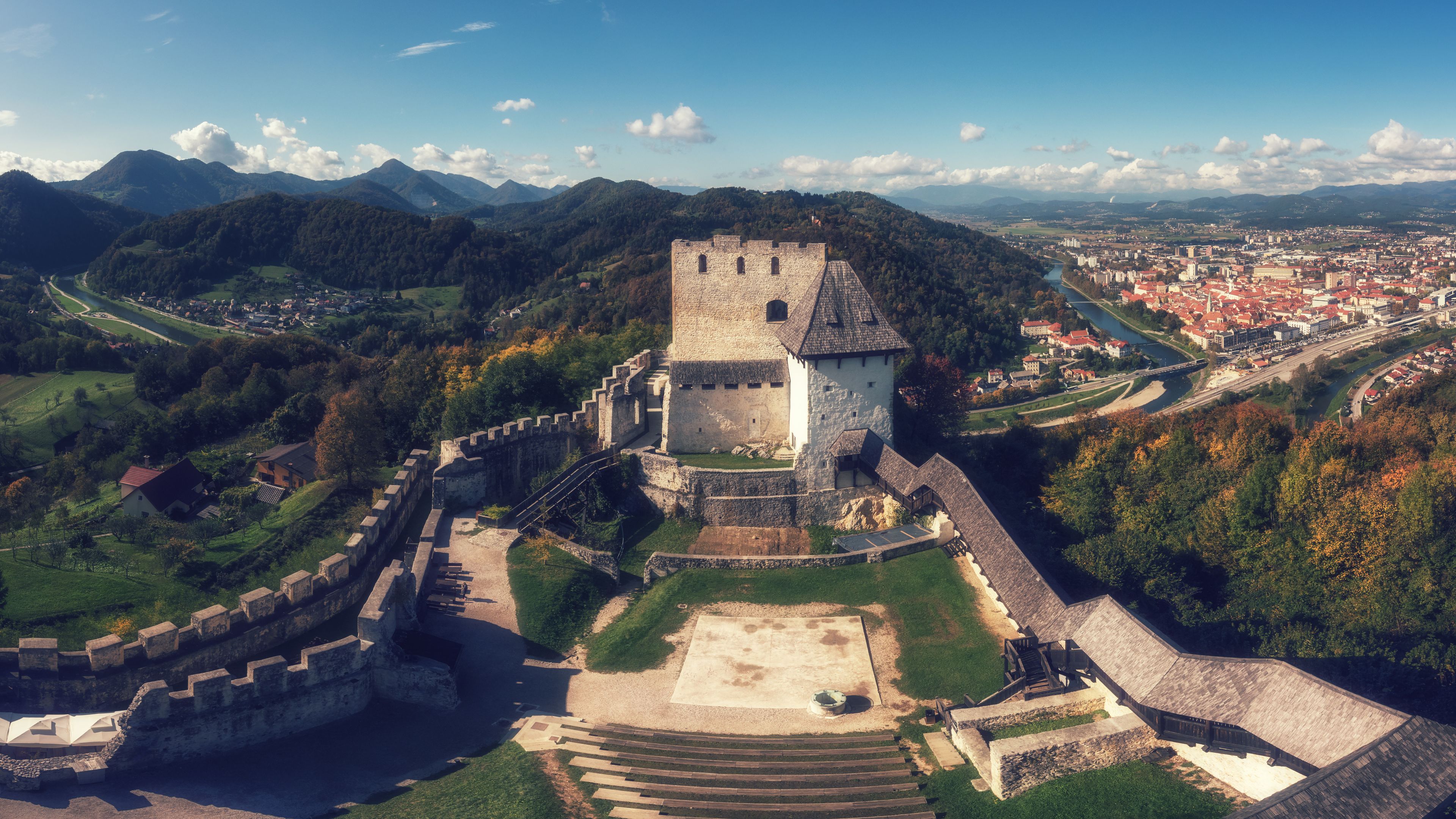 Celje Old castle (Celjski Stari grad), amazing aerial view of medieval fortification and town of Celje in Lasko valley in Julian Alps mountains, Slovenia, Styria. Outdoor travel background, panorama