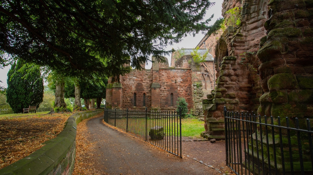 St John the Baptist Church showing a park, heritage elements and fall colors