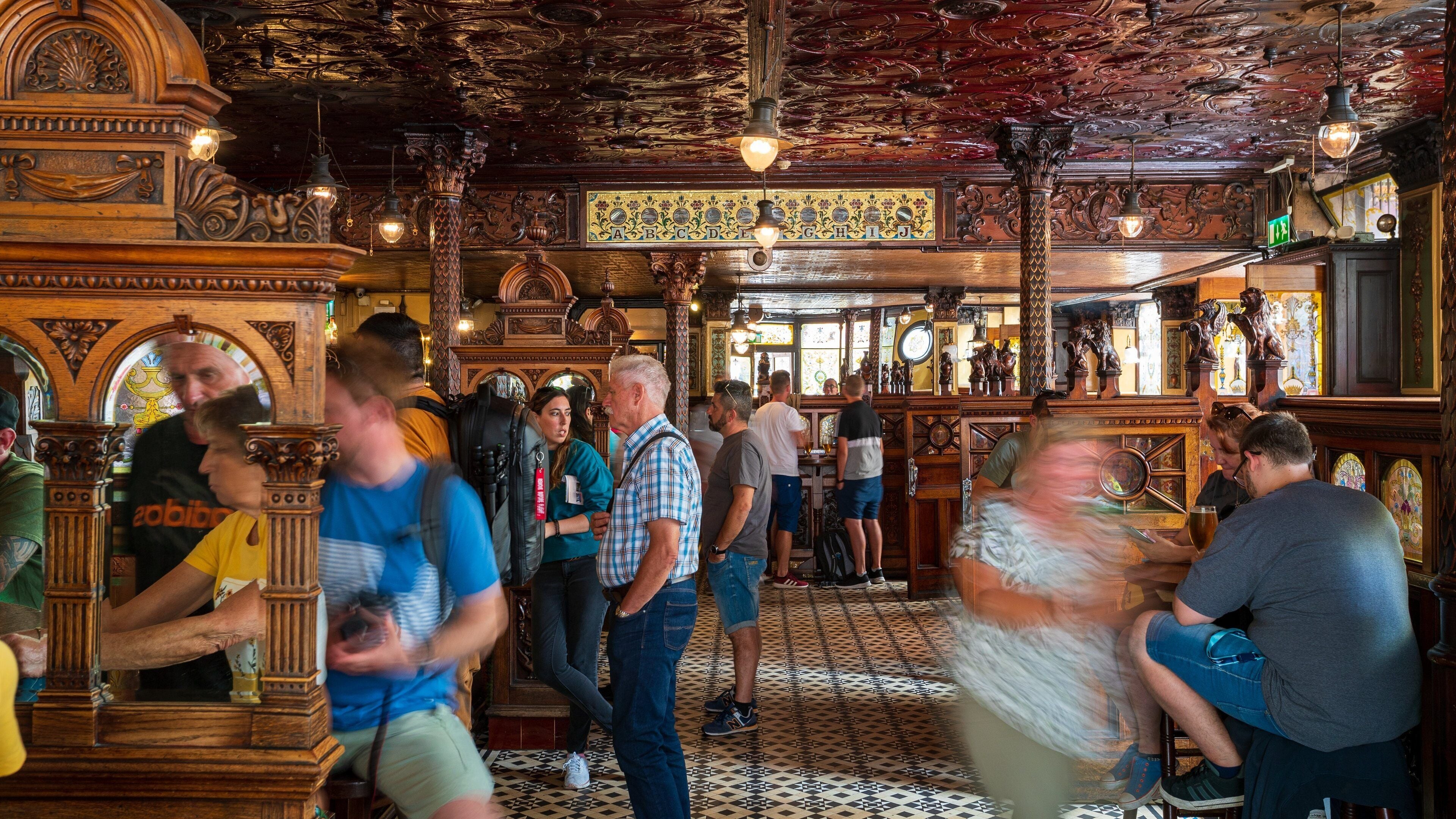Crown Liquor Saloon featuring nightlife, a bar and interior views