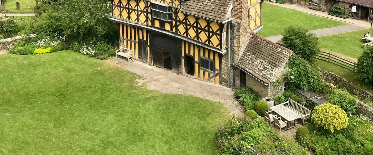 Views from the top of the south tower Stokesay Castle and the gate house taking in the Shropshire countryside