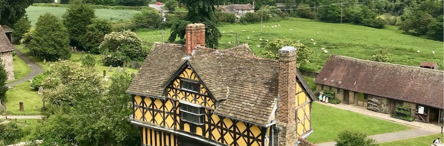 Views from the top of the south tower Stokesay Castle and the gate house taking in the Shropshire countryside