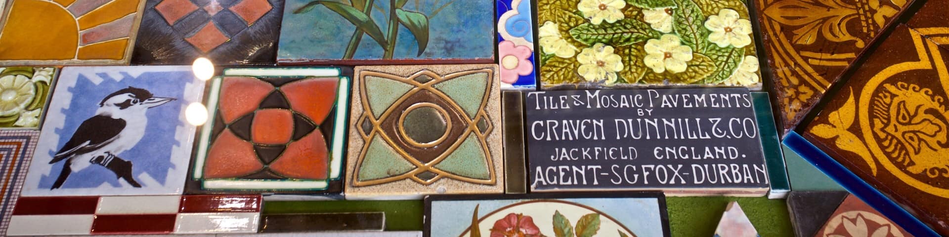 A variety of colorful mosaic tiles with different patterns and designs.